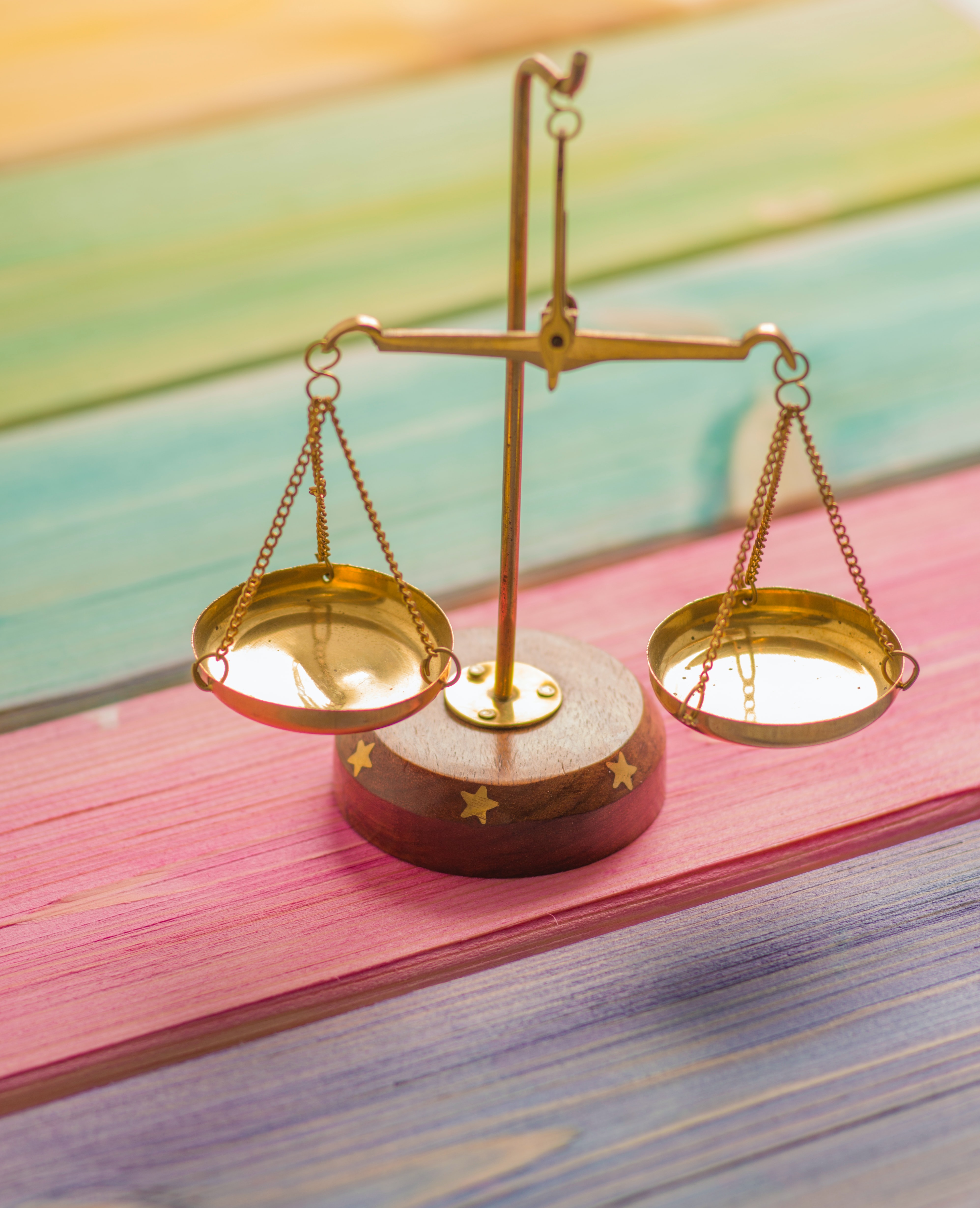 scales on a rainbow-colored table